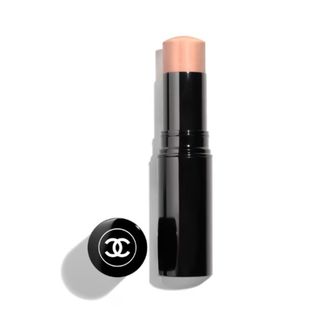 A product shot of the Chanel Baume Essential Multi-use Glow stick in shade Moonlight Kiss, on a white background