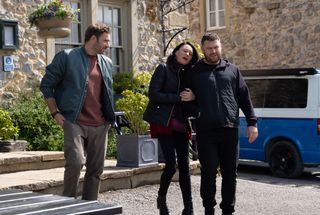 Chas says goodbye to her son Aaron and his husband John