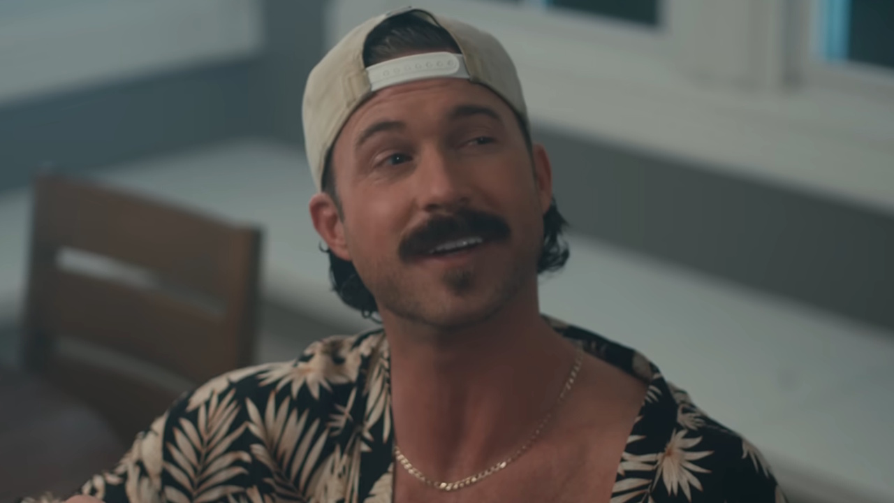 Riley Green is shown in his Worst Way music video.