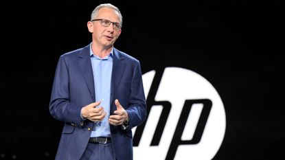 Former HP chief executive and PayPal CEO Enrique Lores pictured during a keynote presentation at CES 2023 in Las Vegas, Nevada.