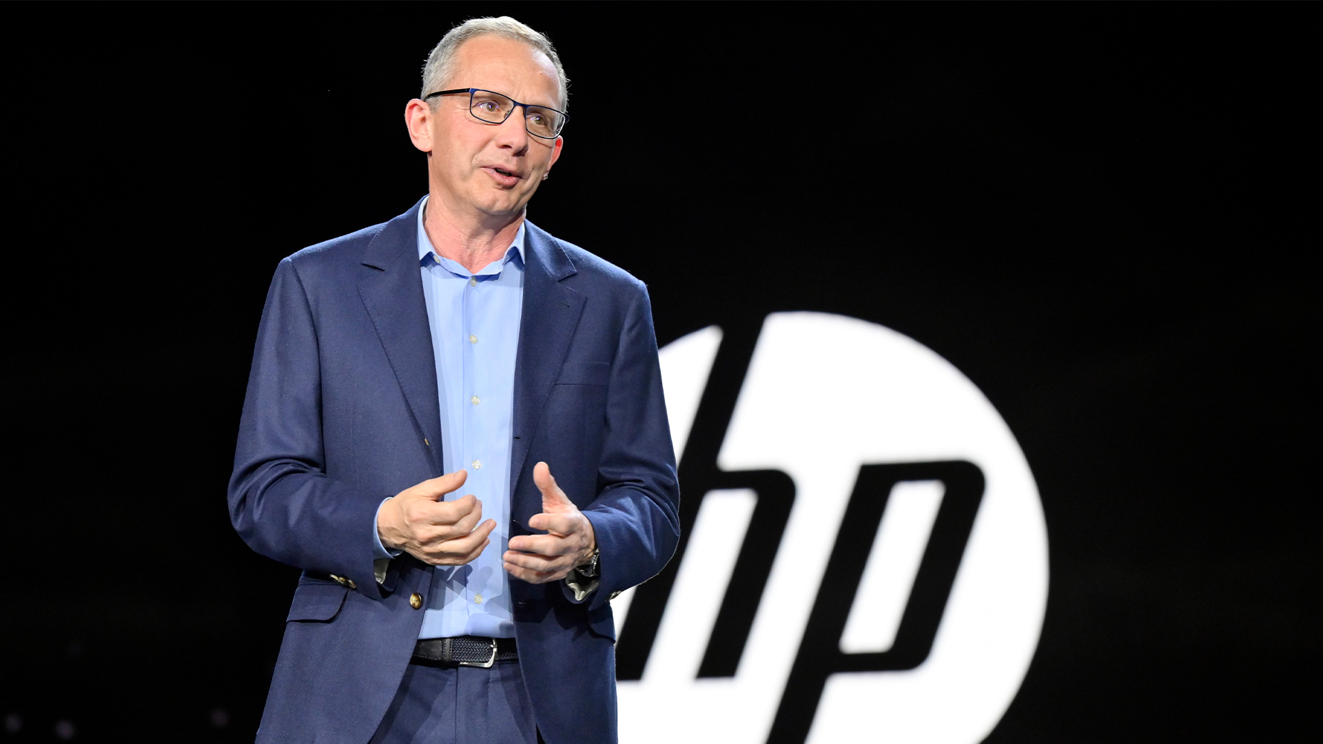 Former HP chief executive and PayPal CEO Enrique Lores pictured during a keynote presentation at CES 2023 in Las Vegas, Nevada.