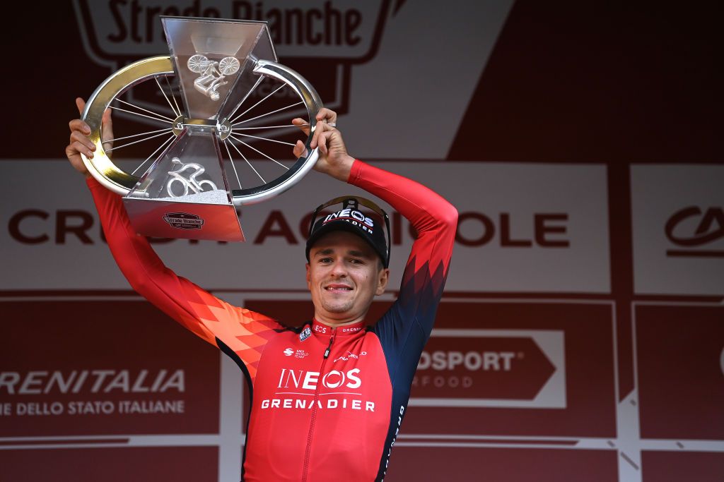 SIENA ITALY MARCH 04 Thomas Pidcock of The United Kingdom and Team INEOS Grenadiers celebrates at podium as race winner during the Eroica 17th Strade Bianche 2023 Mens Elite a 184km one day race from Siena to Siena 318m StradeBianche on March 04 2023 in Siena Italy Photo by Tim de WaeleGetty Images