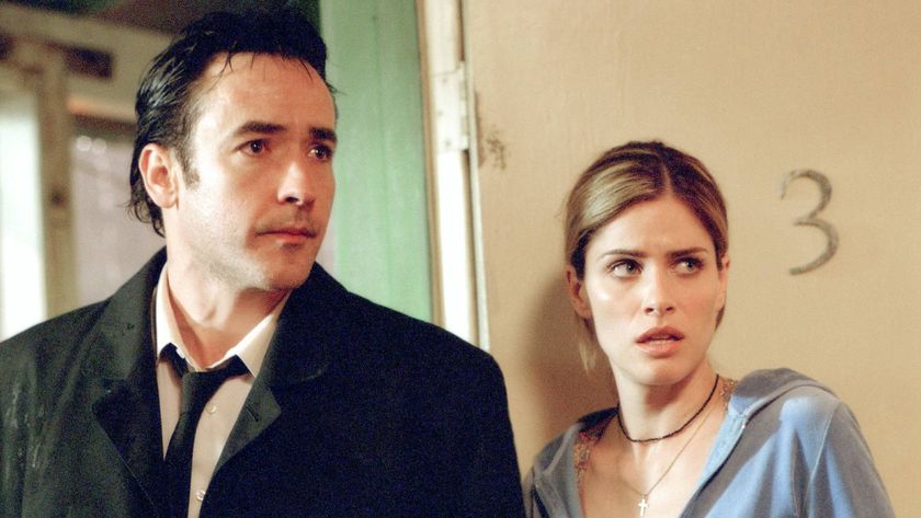 John Cusack and Amanda Peet in Identity (2003)