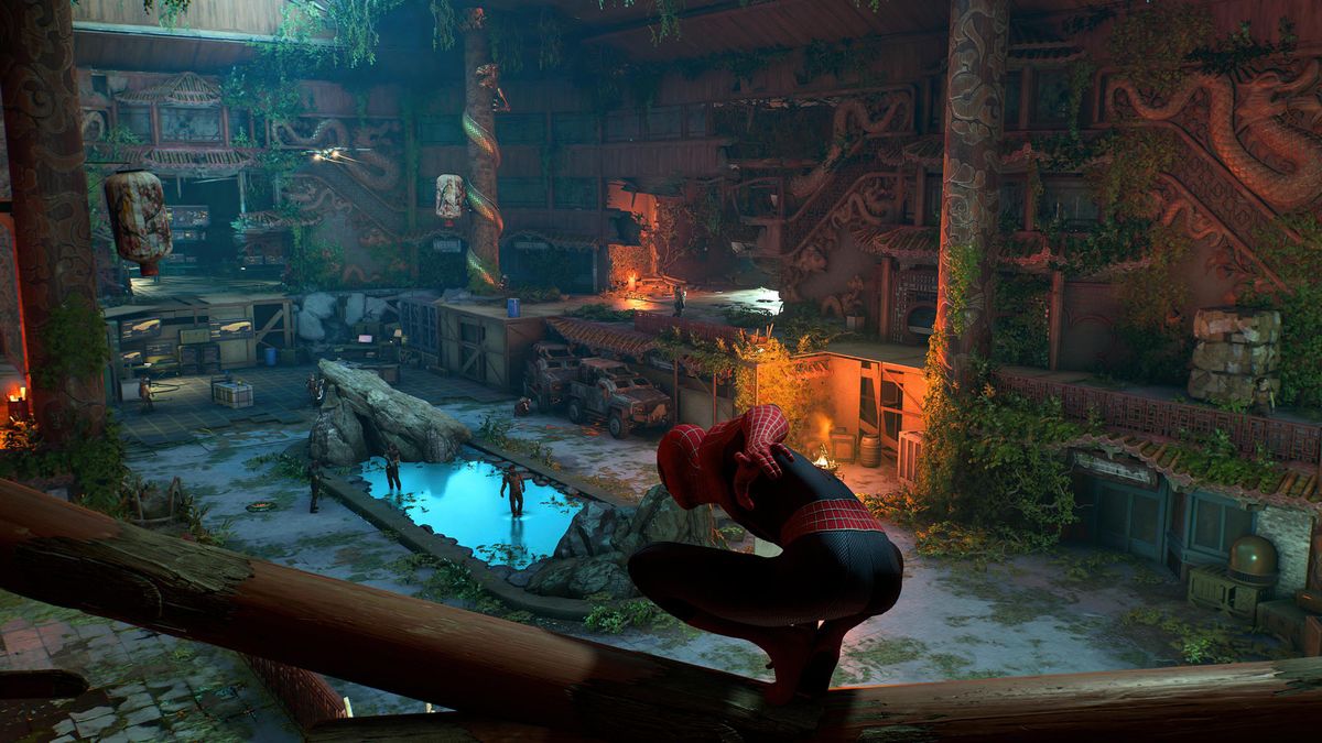 Peter uses a cracked wooden vantage point looking over armed thugs in an overgrown Chinatown interior in Marvel's Spider-Man 2