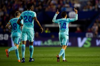 Philippe Coutinho (right) celebrates after scoring for Barcelona against Levante in La Liga in May 2018.