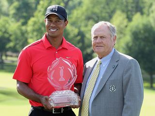 Tiger Woods receiving the Memorial Tournament trophy from Jack Nicklaus