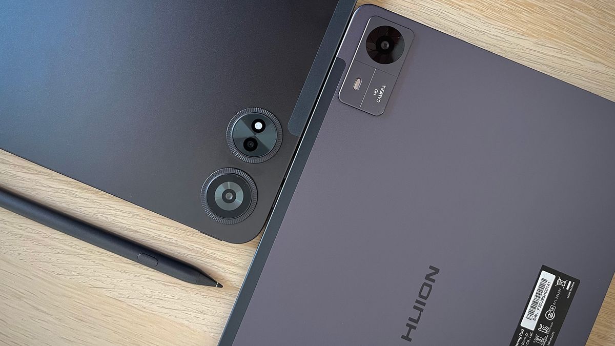 Rear of Huion Kamvas Slate 11 (right) and Huion Kamvas Slate 13 (left) on a wooden table