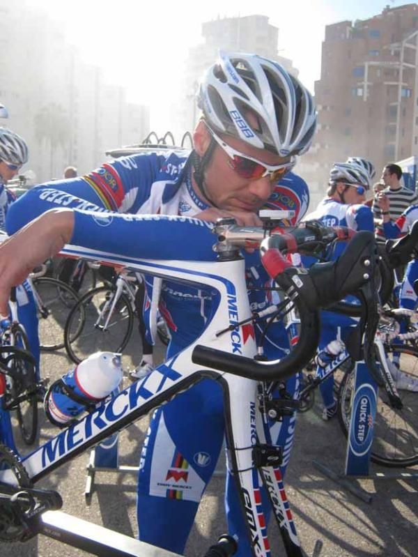 Tom Boonen waits for new bar tape to be fitted.