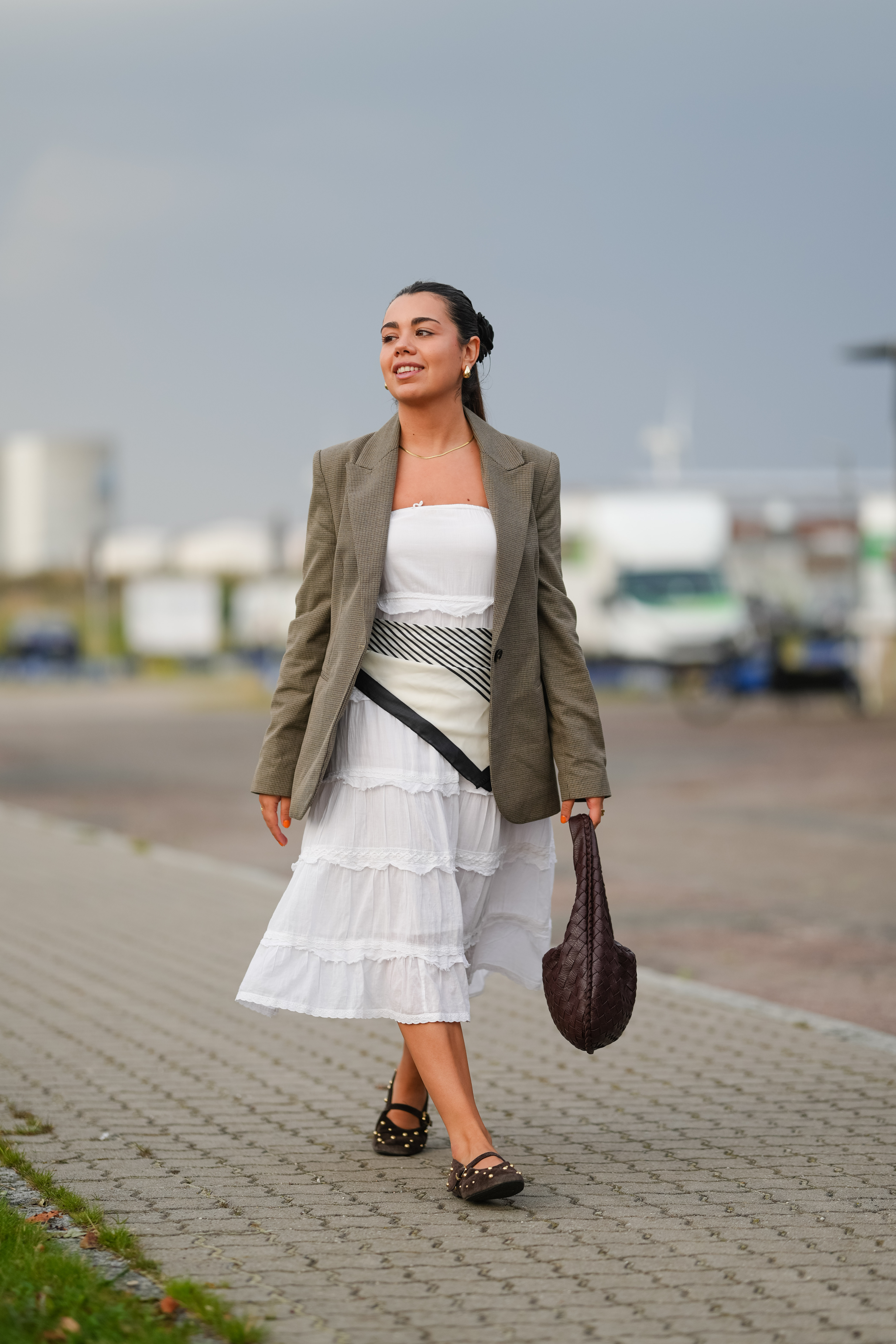 A guest wore studded Mary Jane ballet flats during Copenhagen Fashion Week