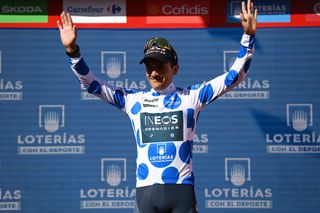 ALTO DEL PIORNAL SPAIN SEPTEMBER 08 Richard Carapaz of Ecuador and Team INEOS Grenadiers celebrates winning the Polka dot mountain jersey on the podium ceremony after the 77th Tour of Spain 2022 Stage 18 a 192km stage from Trujillo to Alto del Piornal 1163m LaVuelta22 WorldTour on September 08 2022 in Alto del Piornal Caceres Spain Photo by Justin SetterfieldGetty Images