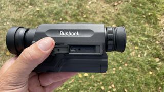 The Bushnell Equinox X650 Night Vision 5x32 Monocular in the hand