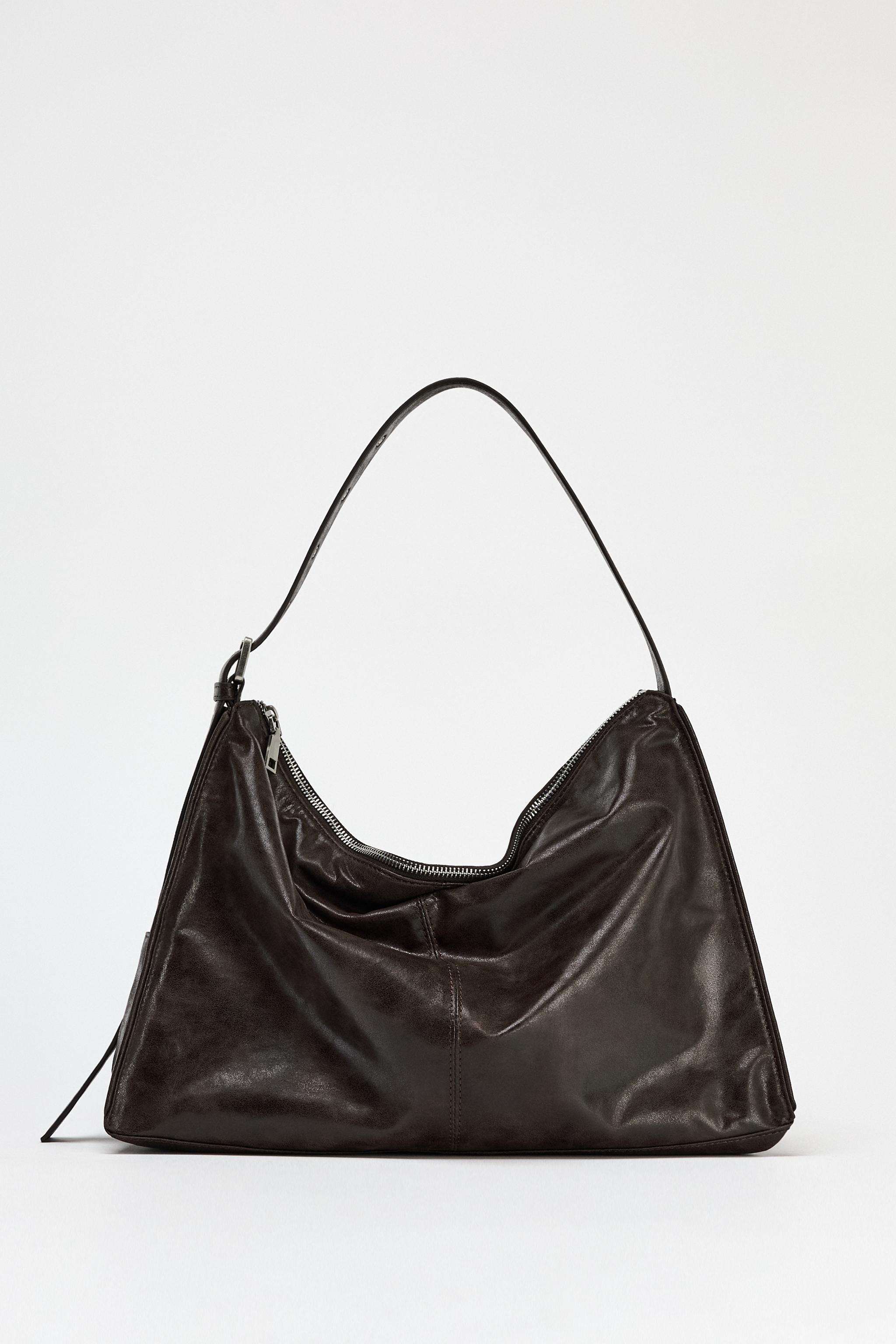 Large Soft Bucket Bag With Metal Eyelets