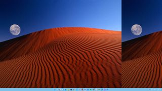 Microsoft Windows XP red moon desert wallpaper with red sand, the moon, and a blue sky