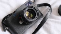Leica M11-P digital camera on a white cloth 