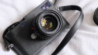 Leica M11-P digital camera on a white cloth 