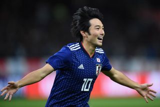 Shoya Nakajima of Japan celebrates scoring a goal during the international friendly match bewteen Japan and Kyrgyz at Toyota Stadium on November 20, 2018 in Toyota, Aichi, Japan.