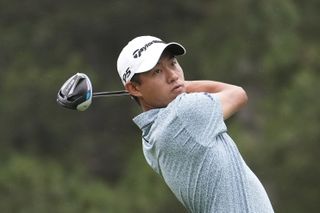 Collin Morikawa of the United States plays his shot from the third tee during the final round of the Rocket Mortgage Classic at Detroit Golf Club
