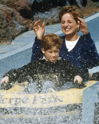 Prince Harry braves a water slide alongside Princess Diana