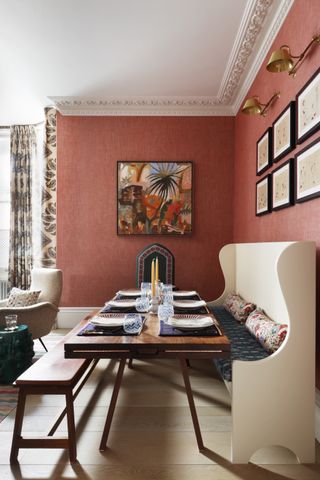 Red dining room with white table