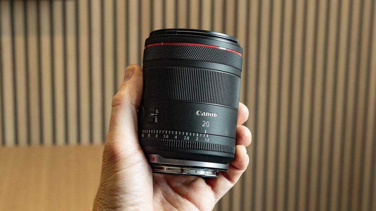Canon RF 20mm F1.4L VCM lens in the hand