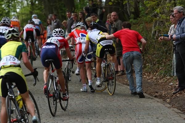 A spectator causes a crash, rather than helping, by pushing Charlotte Colclough (CT M Pinte) into compatriot, Mason (GBR)