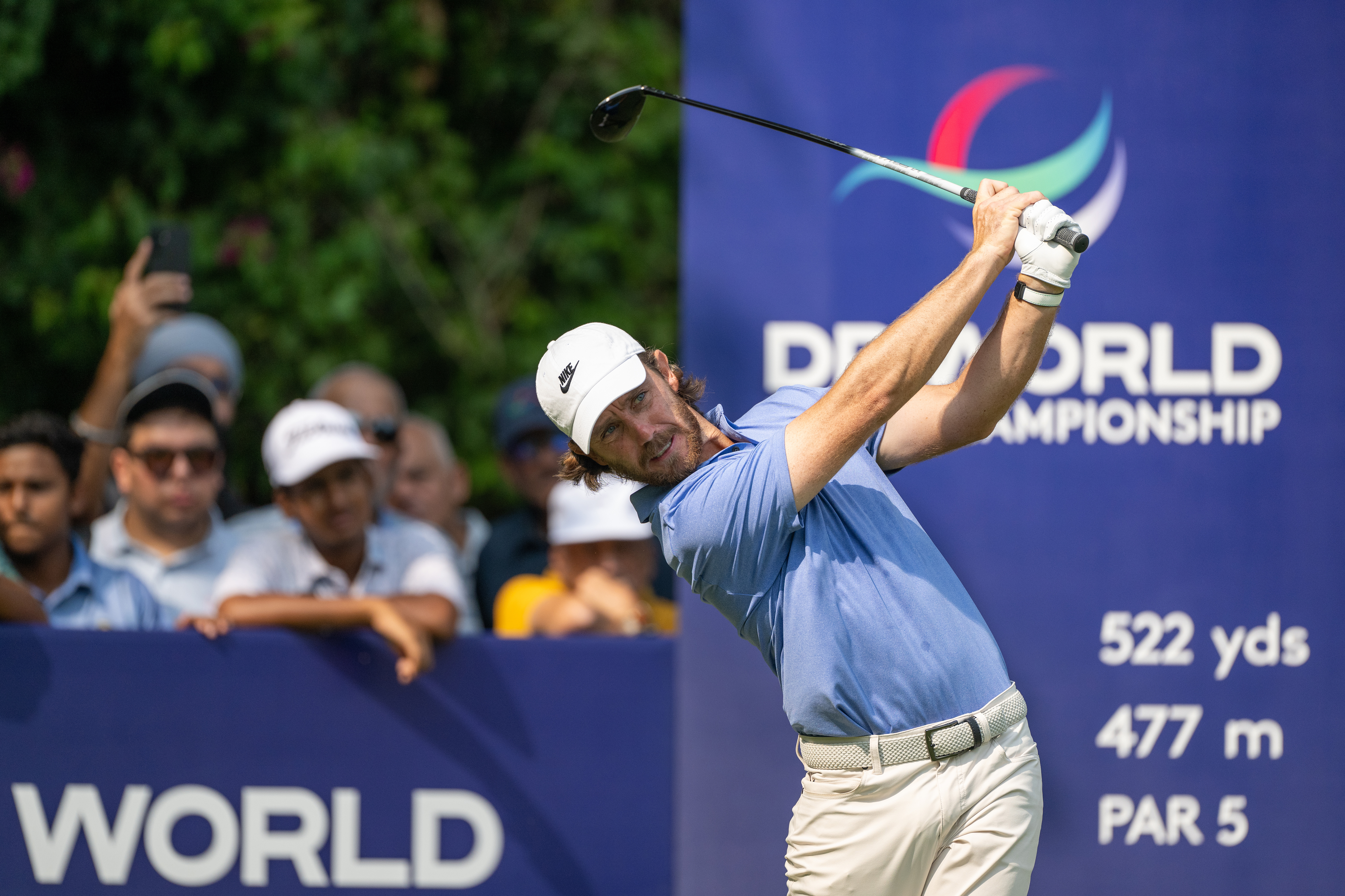 Tommy Fleetwood hits a wood at the 2025 DP World India Championship