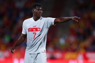 Breel Embolo of Switzerland gestures during the UEFA Nations League League A Group 2 match between Spain and Switzerland at La Romareda on September 24, 2022 in Zaragoza, Spain.