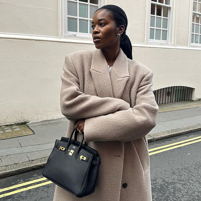 Marilyn carries an Hermes Birkin bag