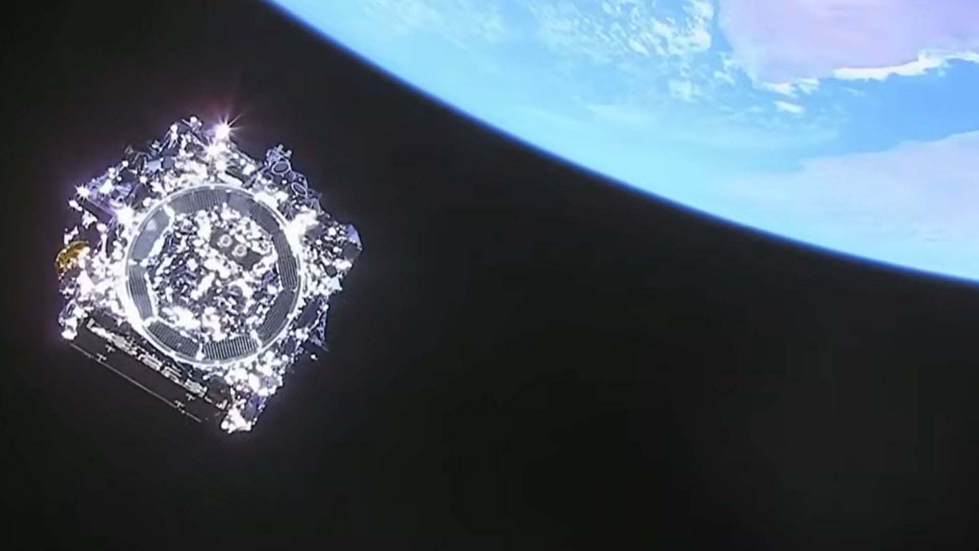 Our last view of Webb before it left Earth orbit for L2, as seen by a camera on the rocket fairing.