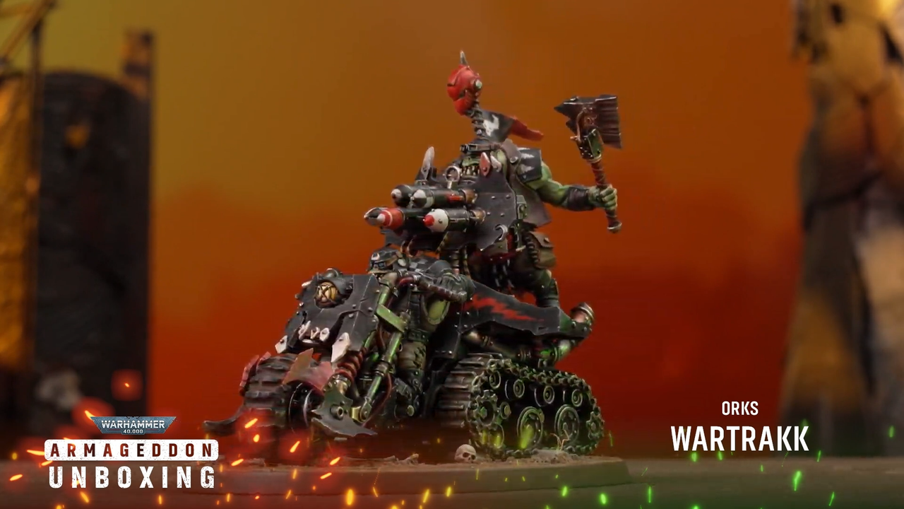An array of Ork models against a fiery background