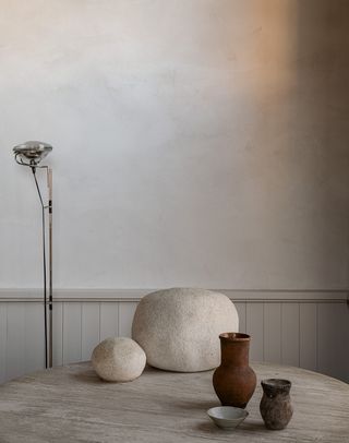 living room table with rocks and objets on it