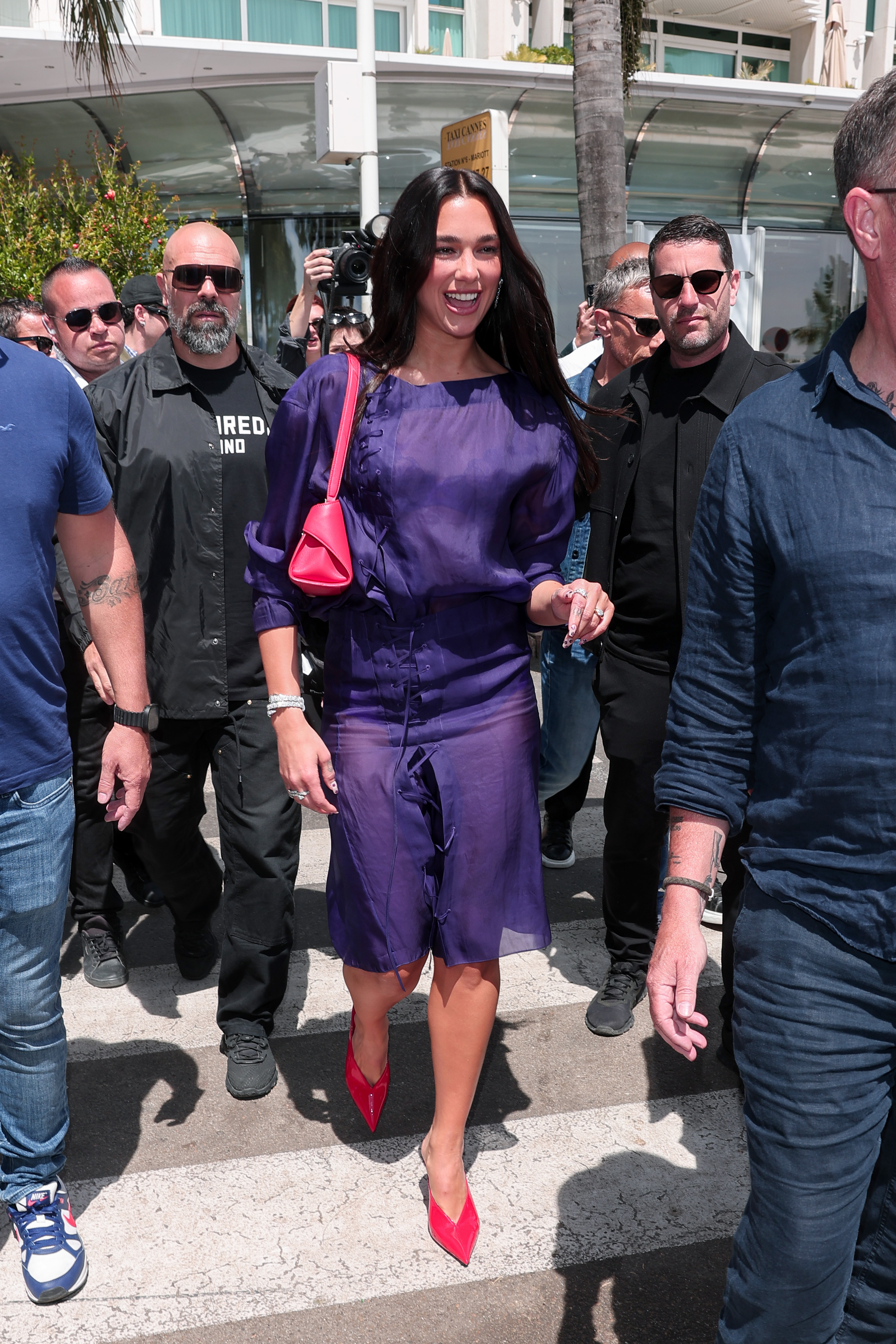 Dua Lipa wore the red and purple color combination during Cannes Film Festival