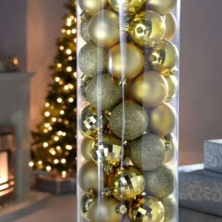 Christmas decor gold bauble set infront