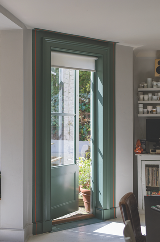 Interior door painted a bold green color