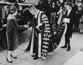 The Queen shakes hands with Harold Macmillan