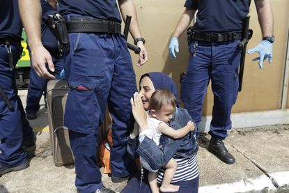 A migrant is detained in Hungary.