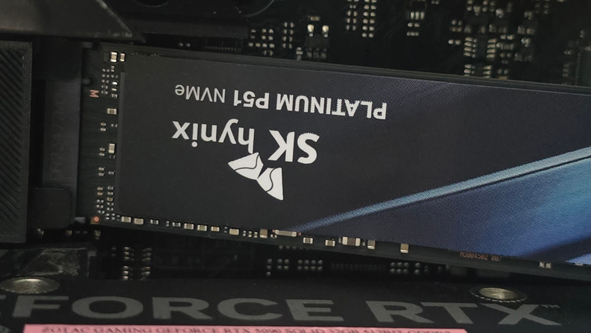 An SK Hynix Platinum P51 drive installed inside a gaming PC.