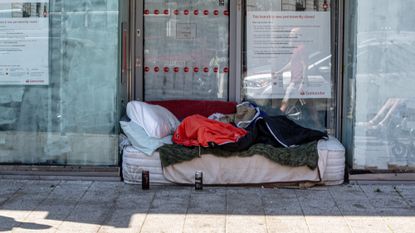 a mattress on a street with sleeping bag in Clacton