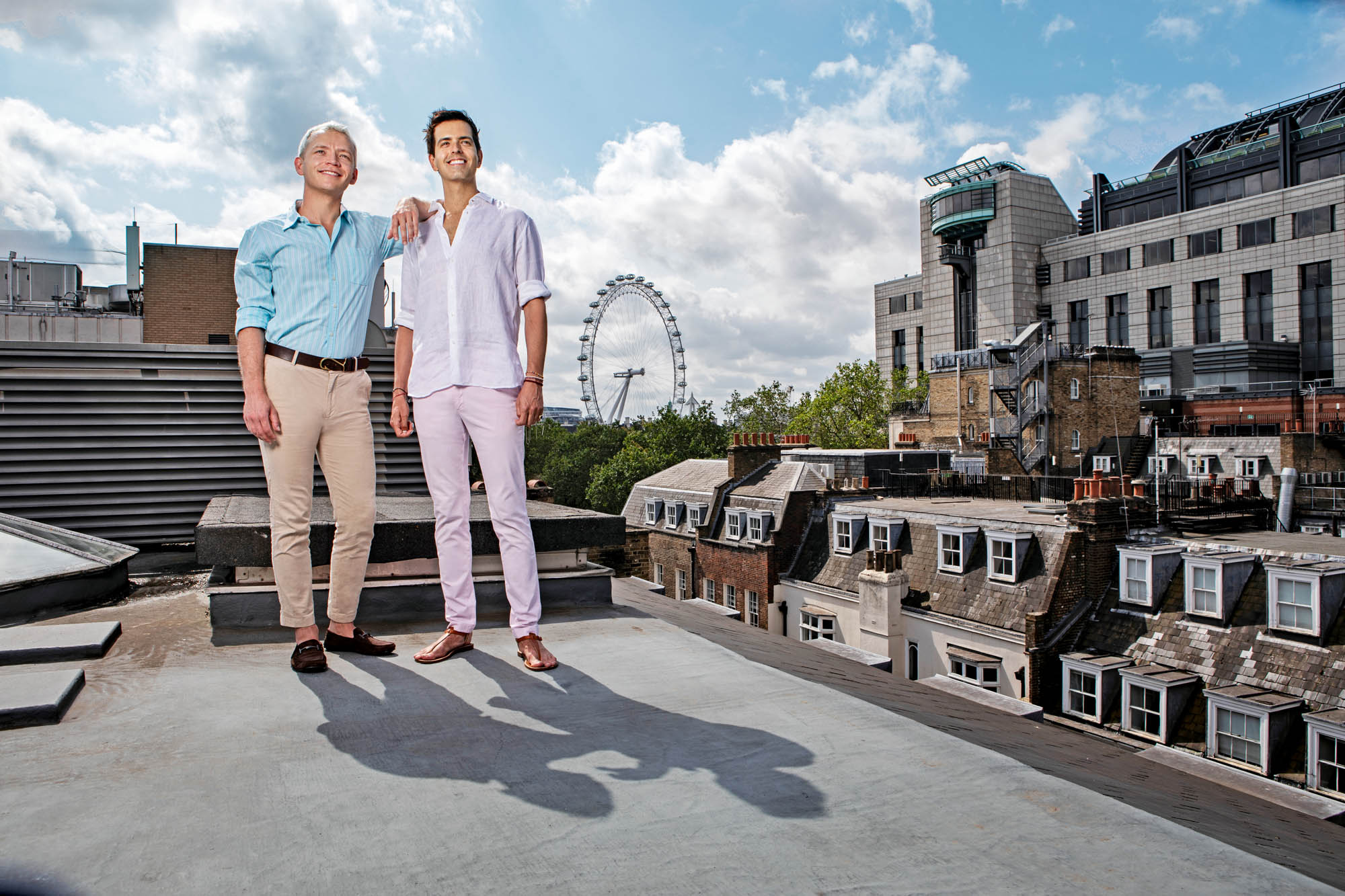 In the heart of the action: Edward Williams (right) and his partner, Andrew Pirrie, on the roof of their apartment near Trafalgar Square.