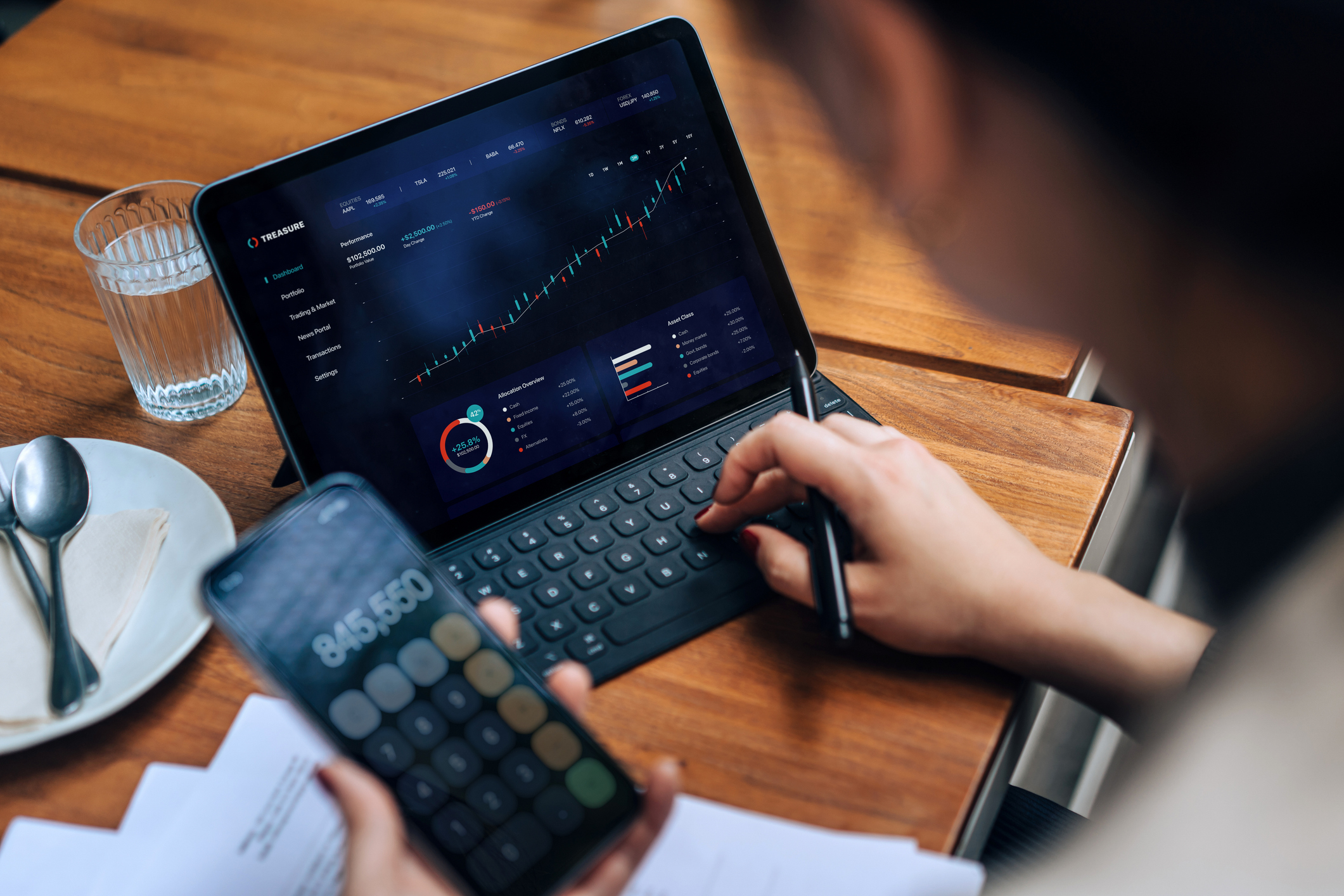 person looking at investment portfolio