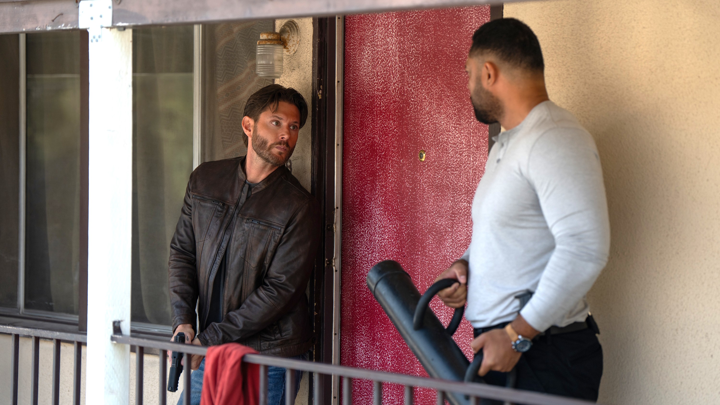 Mark (Jensen Ackles, left) and Luke (Uli Latukefu) prepare to breach a door in a scene from Prime Video's "Countdown"