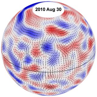 This image shows the paths of giant cell flows on the sun for Aug. 30, 2010. The underlying cell pattern shows westerly winds in red and easterly winds in blue.