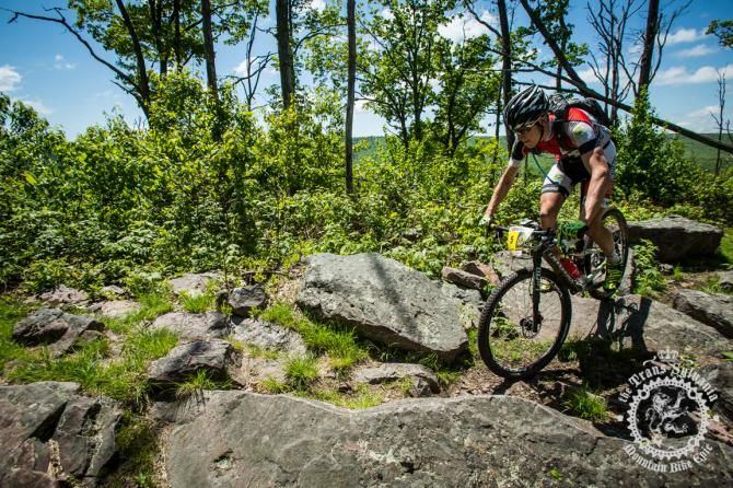 Benjamin Sonntag rolls through rock garden on to p of Tussey Ridge Trail