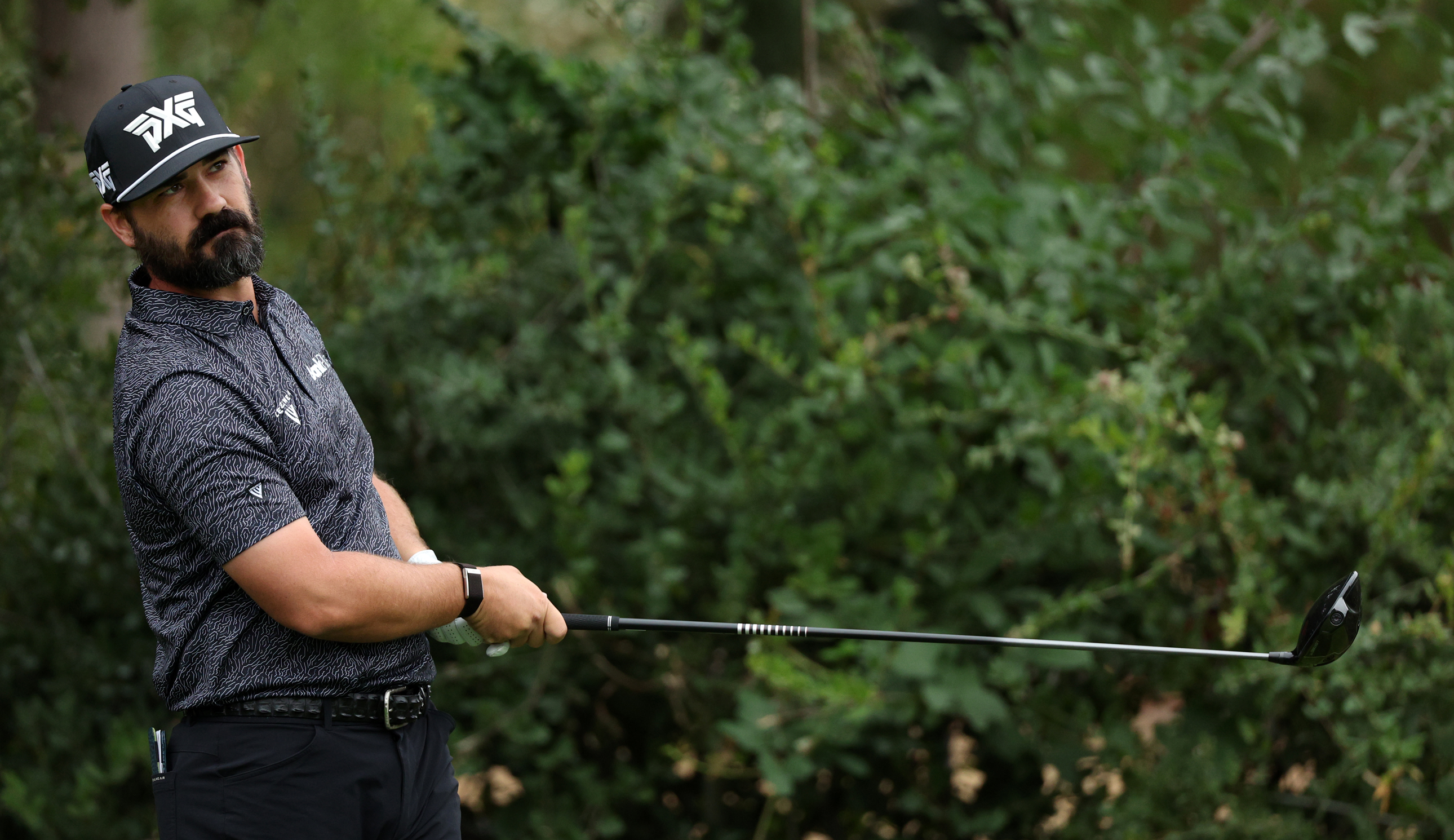 Chad Ramey hits a driver off the tee