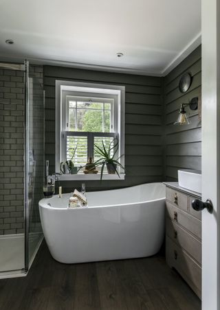 farmhouse shower room with white freestanding bath