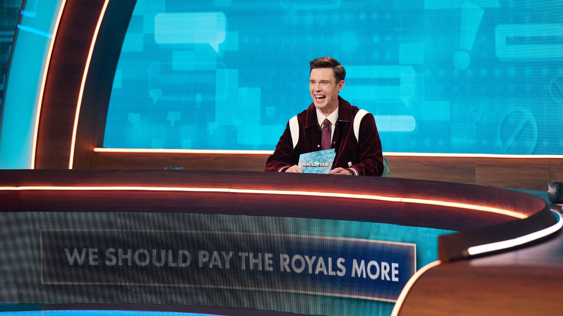 an image of Ed Gamble in the hosting seat in episode one of Unacceptable