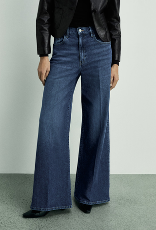 An image of wide-leg jeans from Mango, a classic trouser that makes up London trainer outfits.