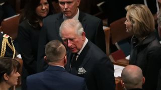 Britain's Prince Charles (C) attends the state funeral for former President George H.W. Bush at the National Cathedral December 05, 2018 in Washington, DC. A WWII combat veteran, Bush served as a member of Congress from Texas, ambassador to the United Nations, director of the CIA, vice president and 41st president of the United States.