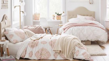Two boho beds with pink blankets