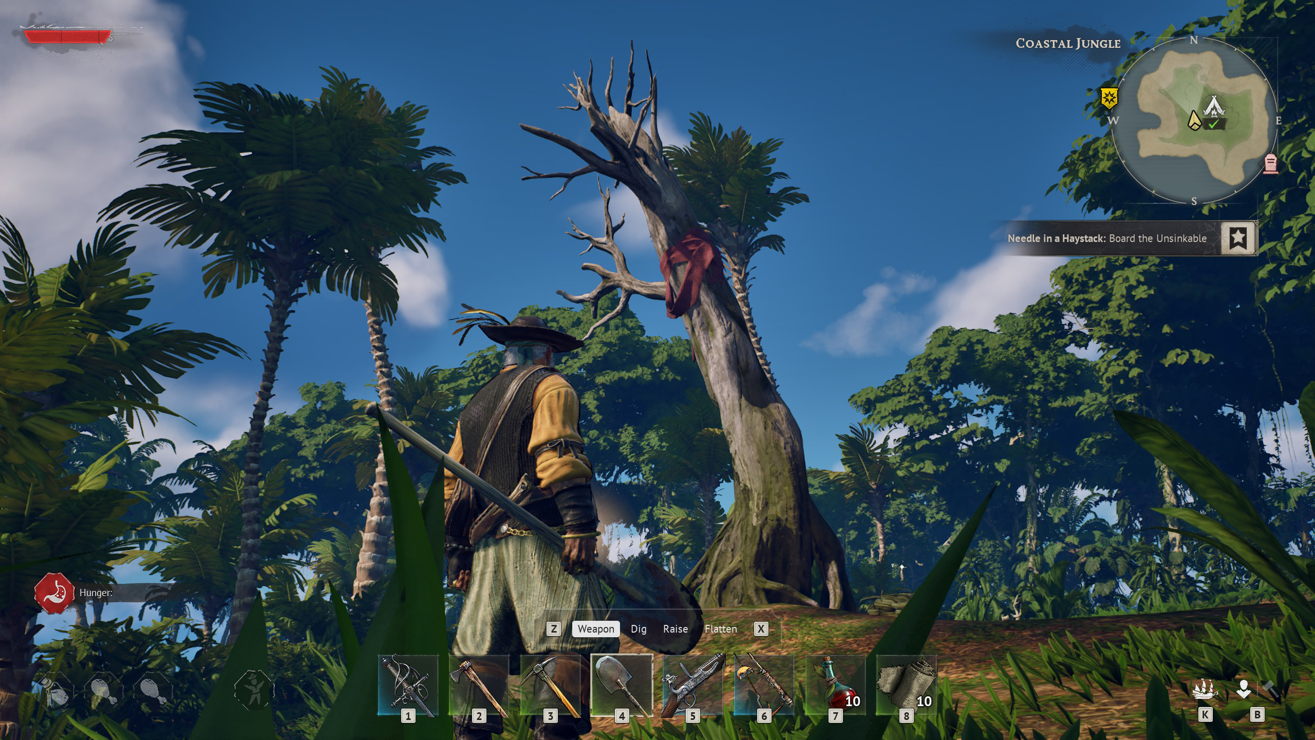 A pirate in front of a tree with a red scarf tied around it